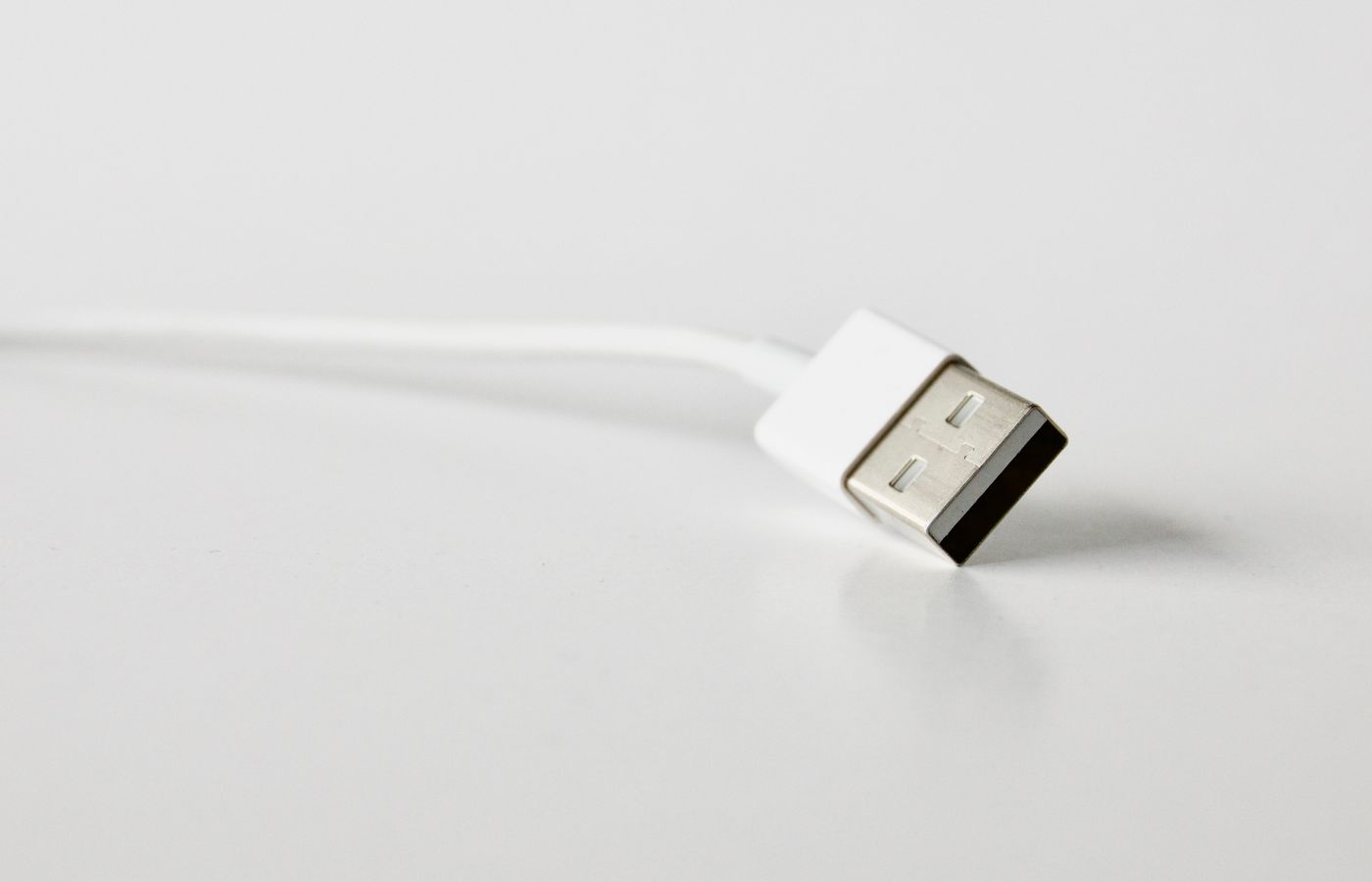 A detailed close-up image of a USB cable, perfect for technology-related projects.