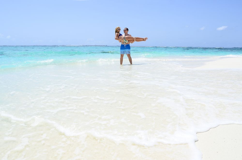 Couple enjoying a beach holiday