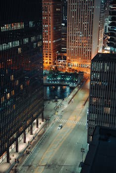 Stunning view of illuminated Chicago streets and skyscrapers at night.