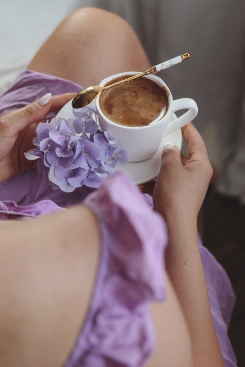 Free Close-Up Shot of a Person Holding a Cup of Chocolate Drink Stock Photo