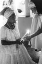 Women Lighting Up Their Candles Together