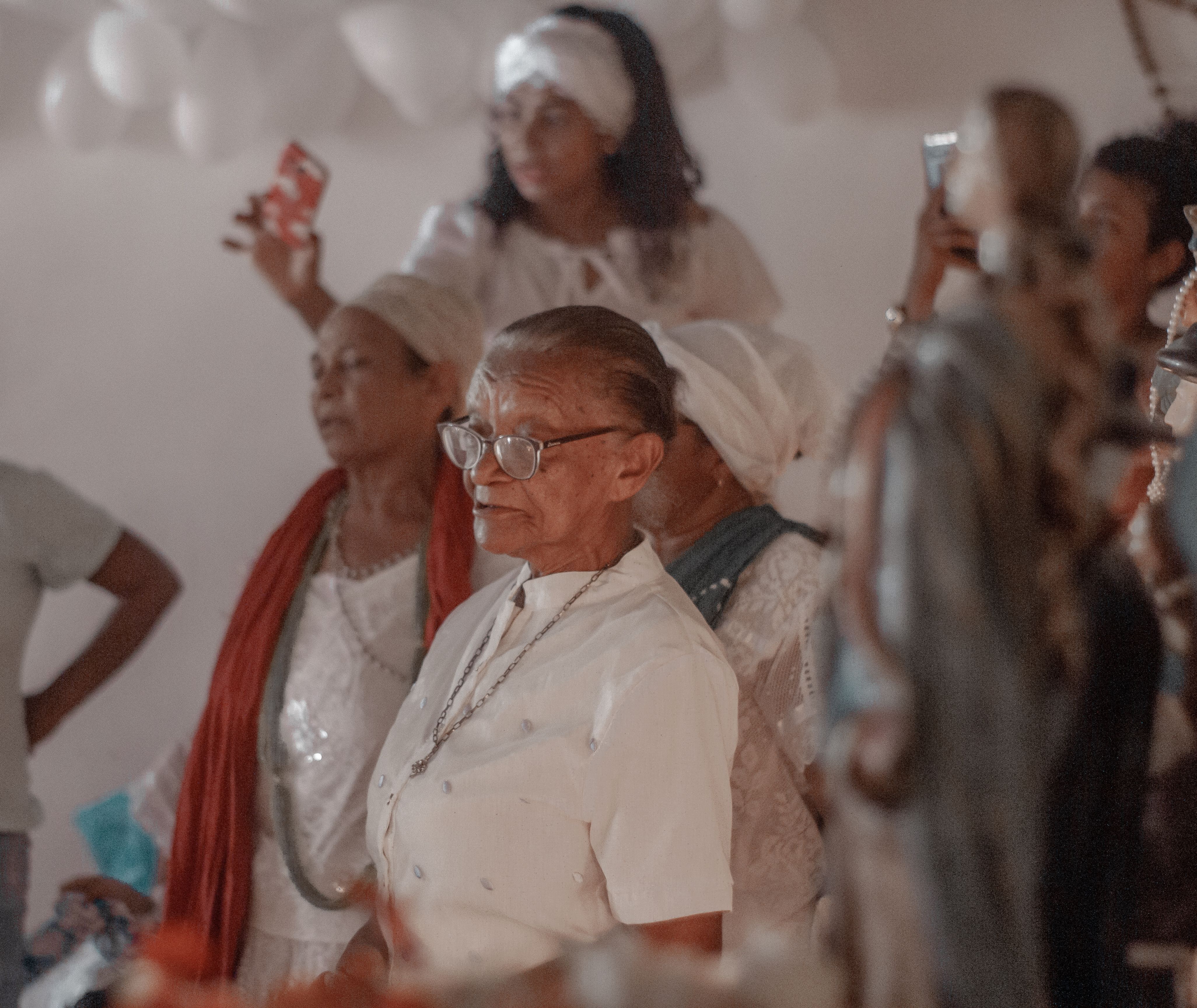 A group of women in traditional attire captured during a cultural ceremony in Amarante, Brazil.