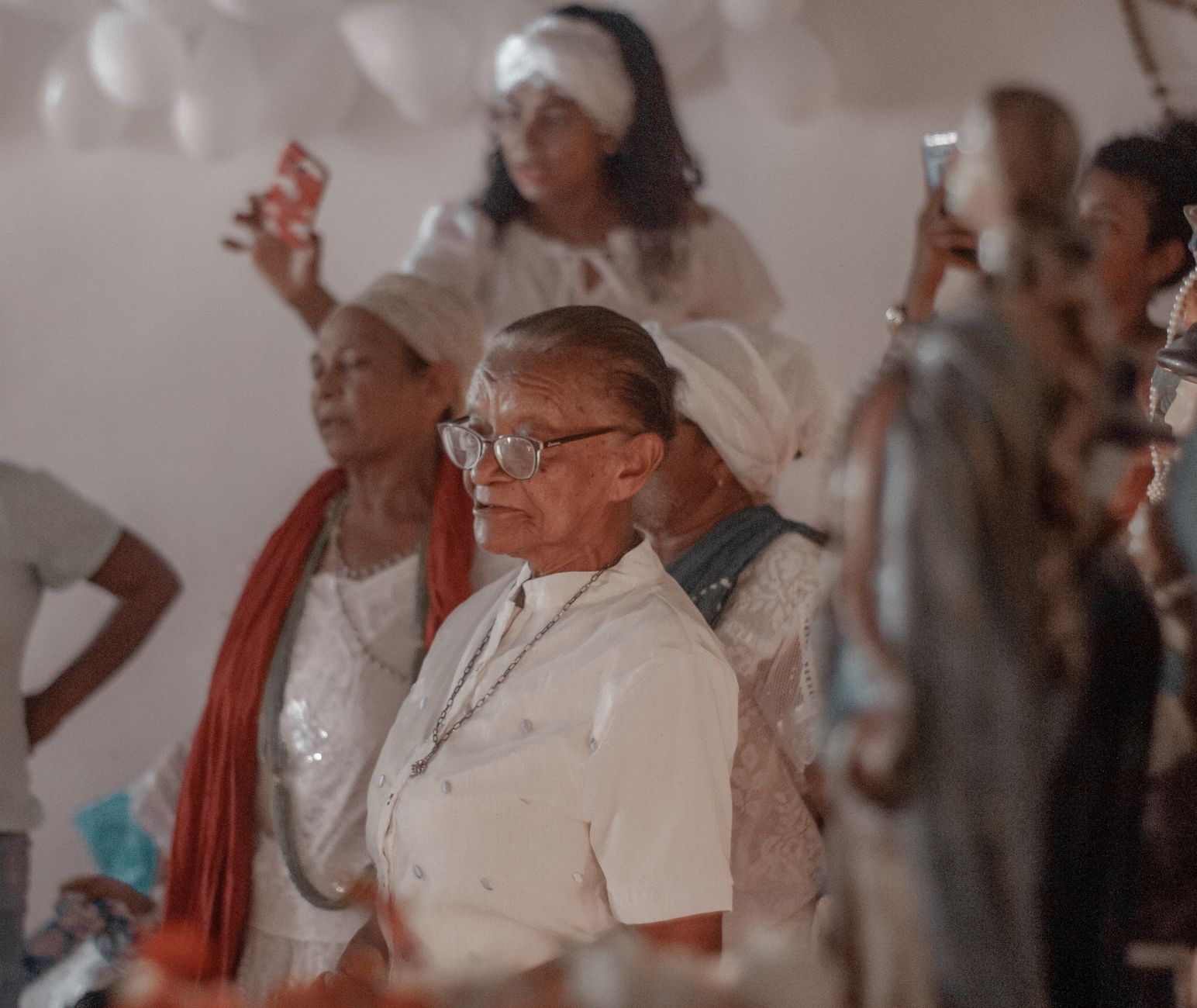 A group of women in traditional attire captured during a cultural ceremony in Amarante, Brazil.
