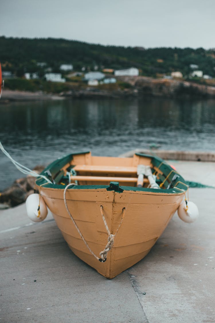 Brown Boat On Ground 