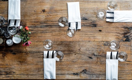 Free High-angle Photography of Utensils With Napkins Stock Photo