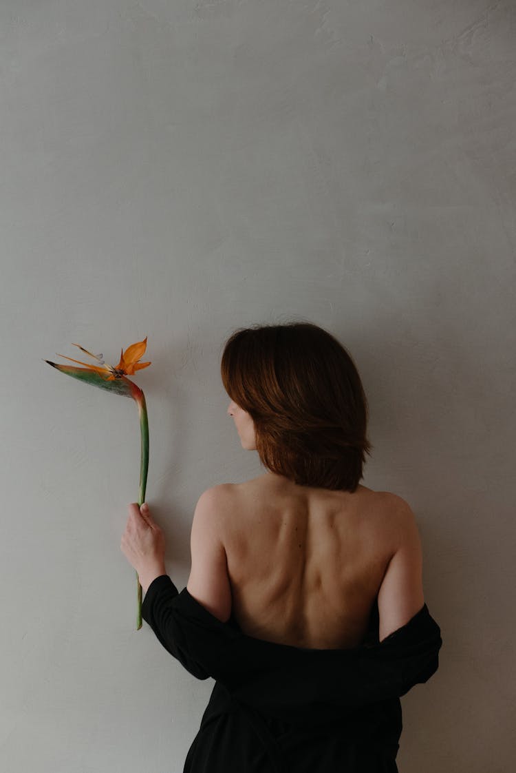 Sensual Woman With Flower