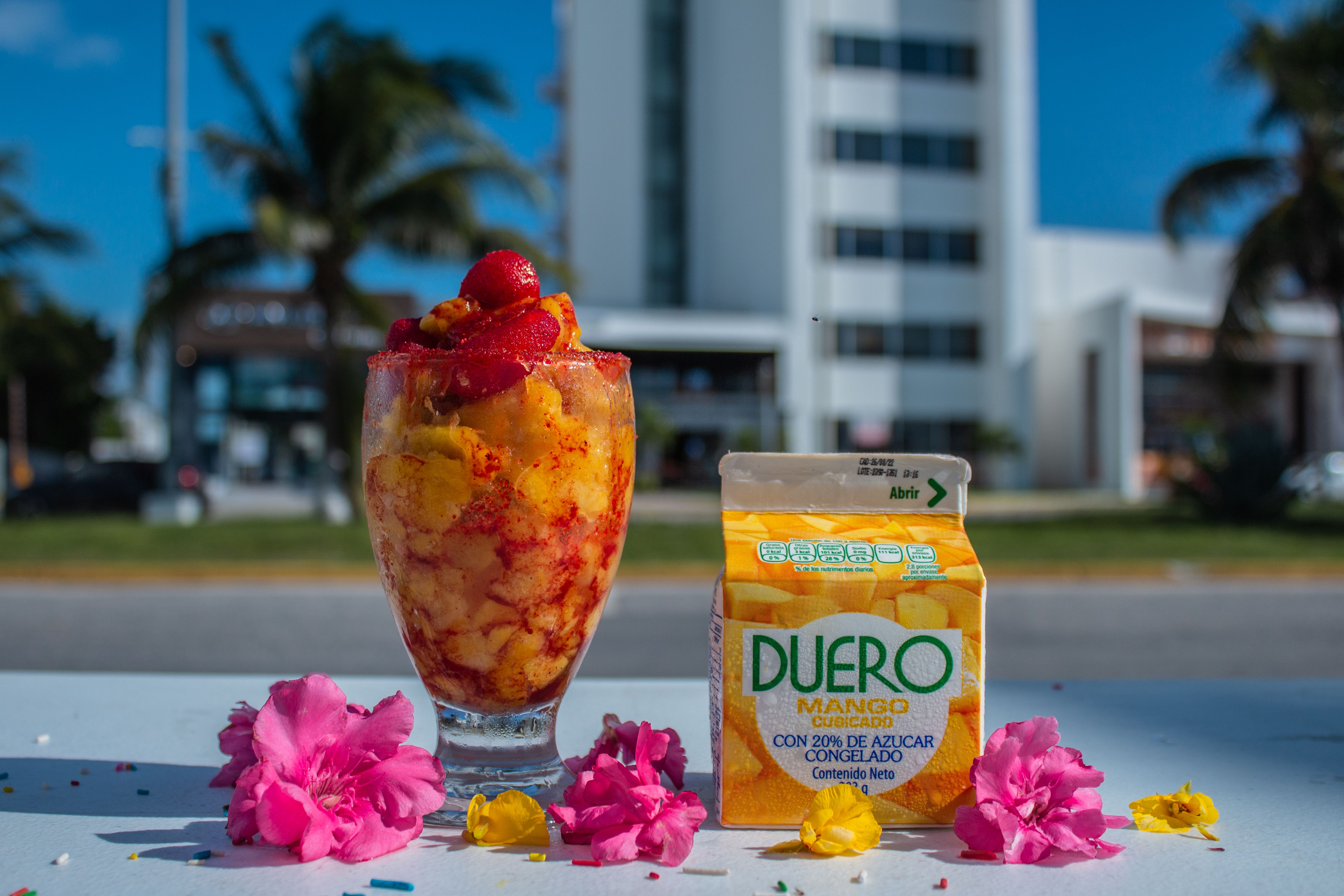 A vibrant and enticing display of various Mexican paletas, showcasing a rainbow of fruit flavors and creamy textures, ready to be enjoyed on a warm day. - mexican restaurants pilsen neighborhood