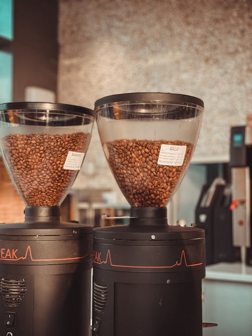Coffee Beans in Coffee Grinders at a Cafe