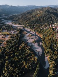 Aerial river winding through forest by Nikolai Lapshin on Pexels