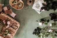 Brown Wooden Round Table With White Flower Bouquet