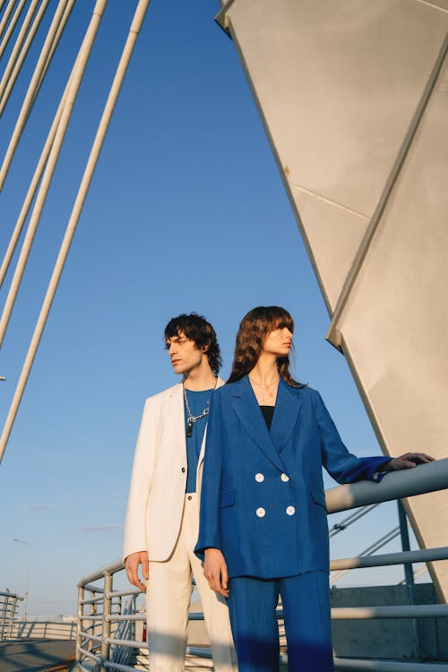 Models in Casual Suits Posing on the Bridge