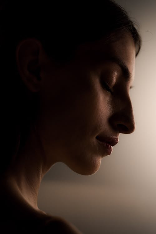 Close-Up Shot of a Woman with Closed Eyes