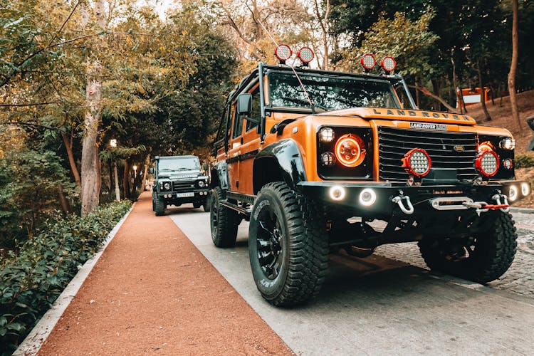 Two Land Rover Defender On The Road