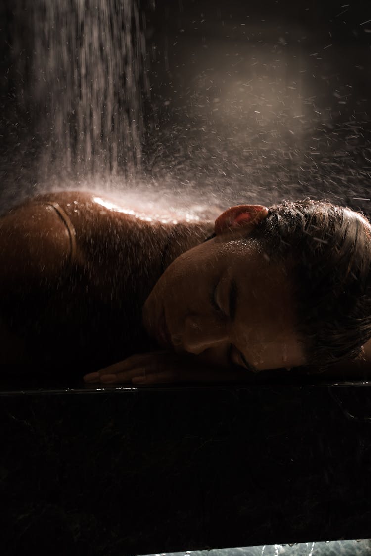 Close-Up Shot Of A Woman Showering 