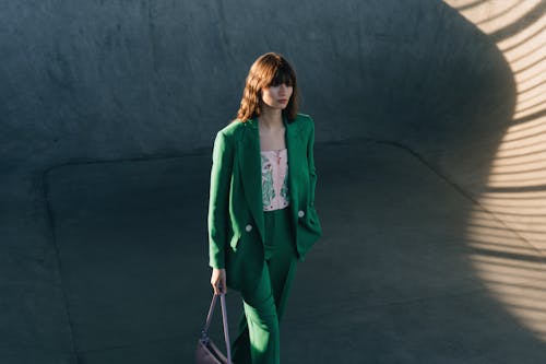 Woman in Green Blazer and Pants