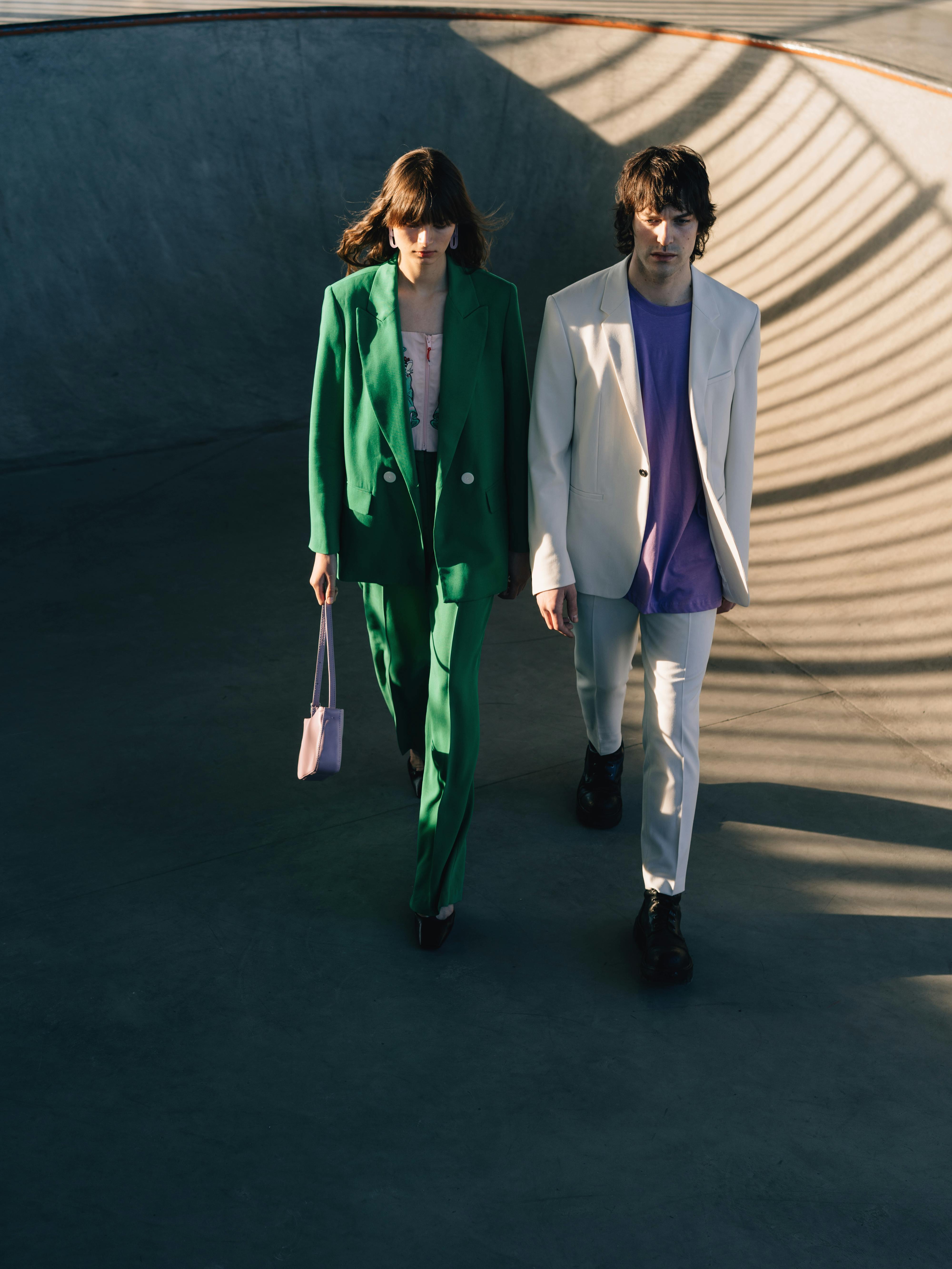 a man and a woman wearing formal wears