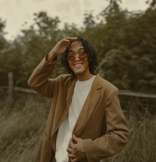 Handsome Man in a Brown Blazer Wearing Sunglasses