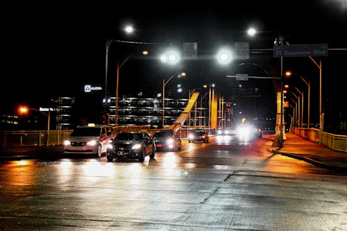 Vehicle on Road at Night