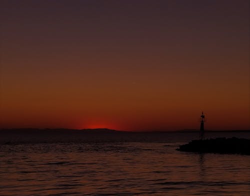 Ücretsiz akşam karanlığı, deniz, deniz feneri içeren Ücretsiz stok fotoğraf Stok Fotoğraflar