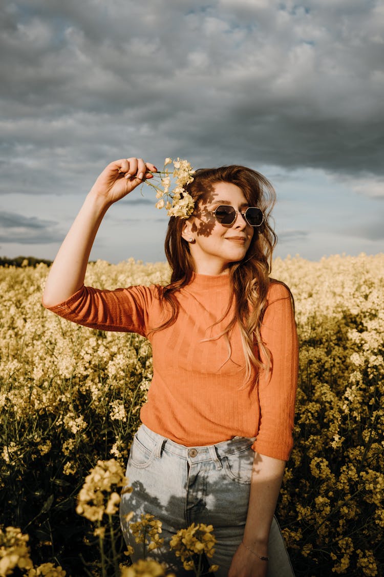 Woman Posing In A Grapeseed Field