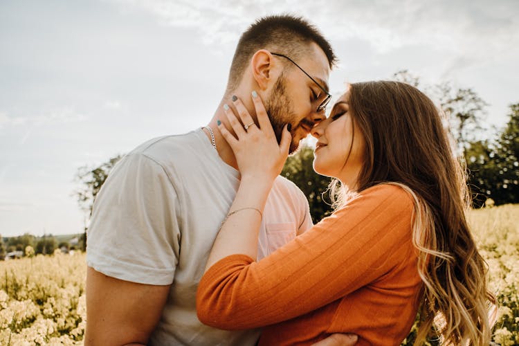 Couple Embracing And Kissing