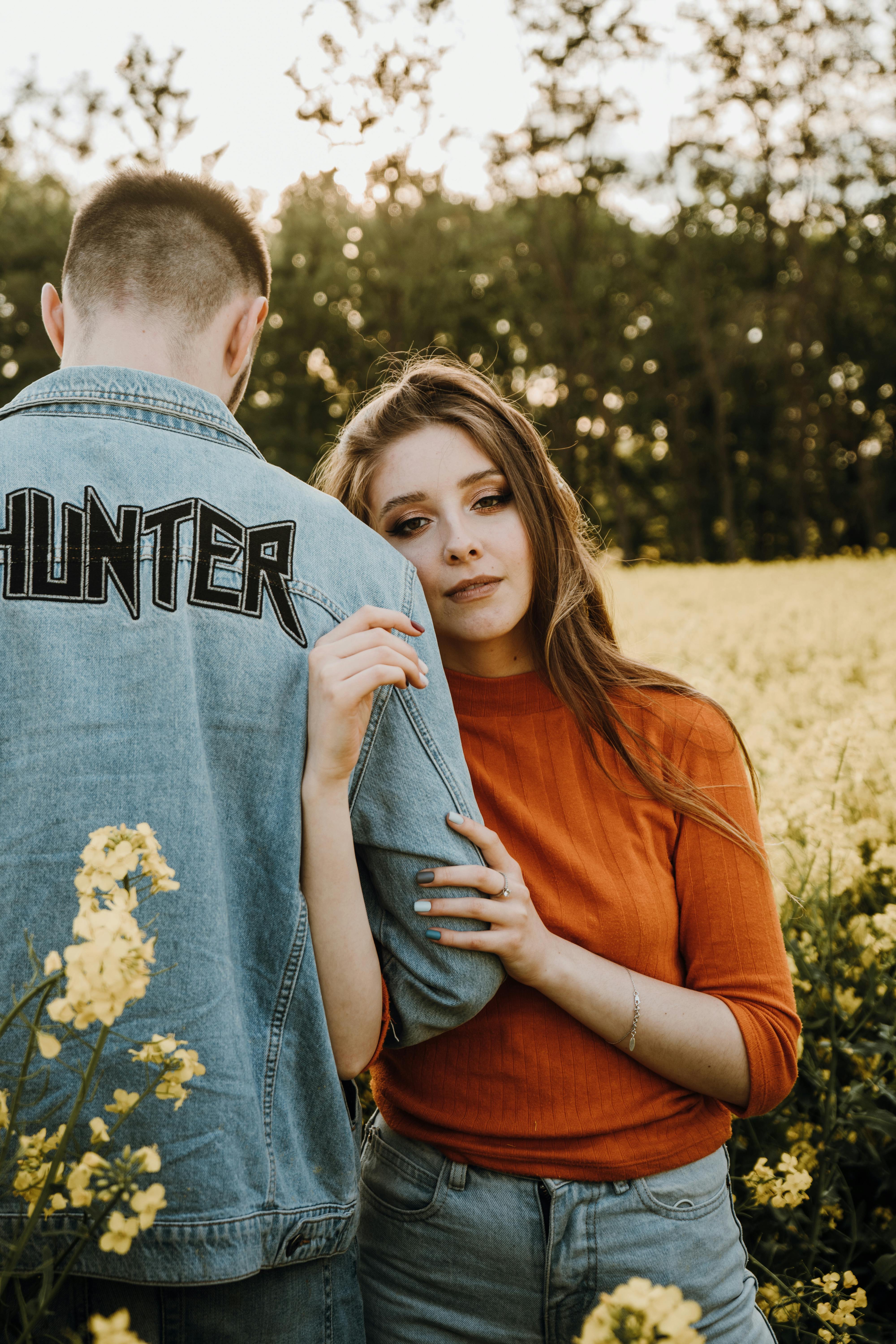 Fashion couple posing while looking down Stock Photo by ©feedough 64958837