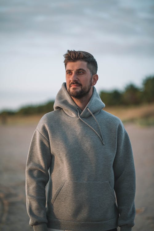 Free A Bearded Man Wearing Gray Hoodie Sweater Stock Photo