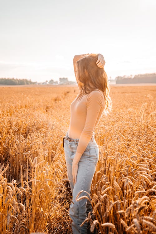 Woman Posing on Wheat Field