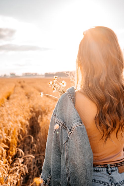 Woman Standing on Crop Field