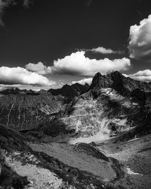 Grayscale Photo of a Mountain Range