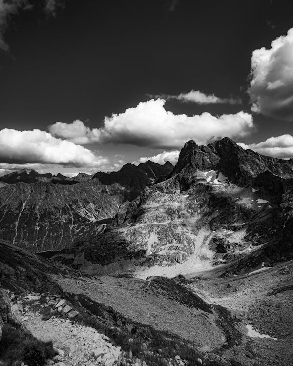 Grayscale Photo of a Mountain Range