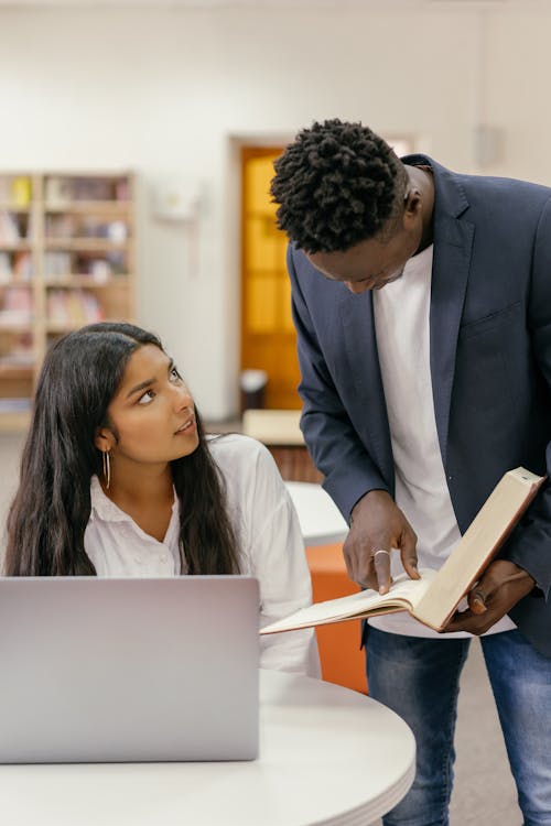 Free A Man Holding a Book Stock Photo