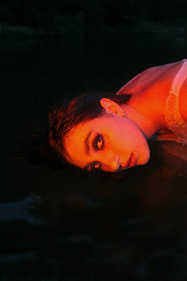 Woman Lying On Beach Posing