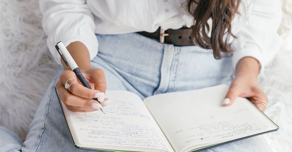 Close-Up Shot of a Student Doing Her Homework · Free Stock Photo