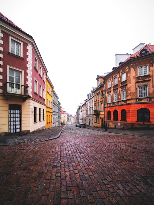 Free Old Buildings and Street in Warsaw Poland Stock Photo