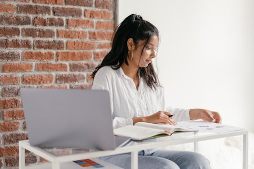 A Woman Doing Her Homework