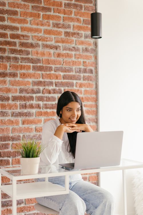 A Woman Studying at Home · Free Stock Photo