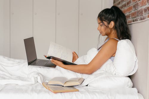 Side View of Woman Studying at Home