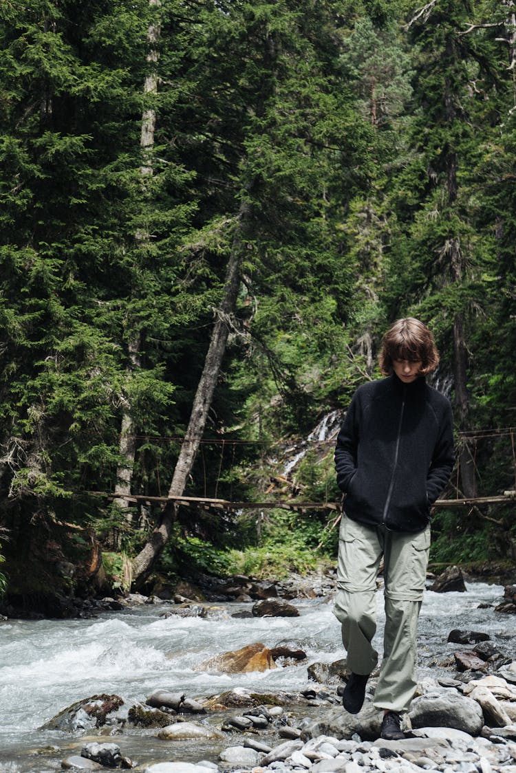 A Woman Hiking In The Forest