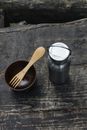 Silver Steel Container Beside Brown Wooden Ladle