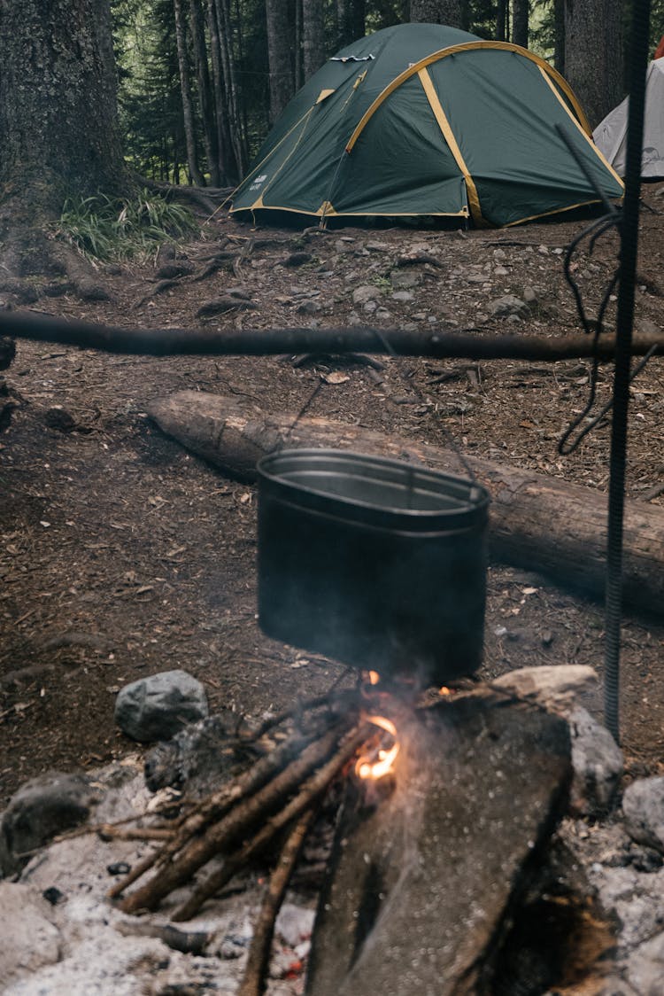 
Cooking Over A Campfire In A Forest