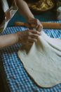 Person Holding Dough