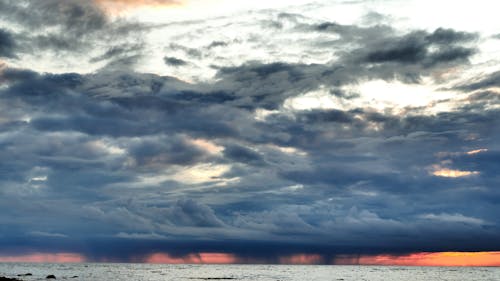 Free stock photo of dramatic sky, ocean, rainfall Stock Photo