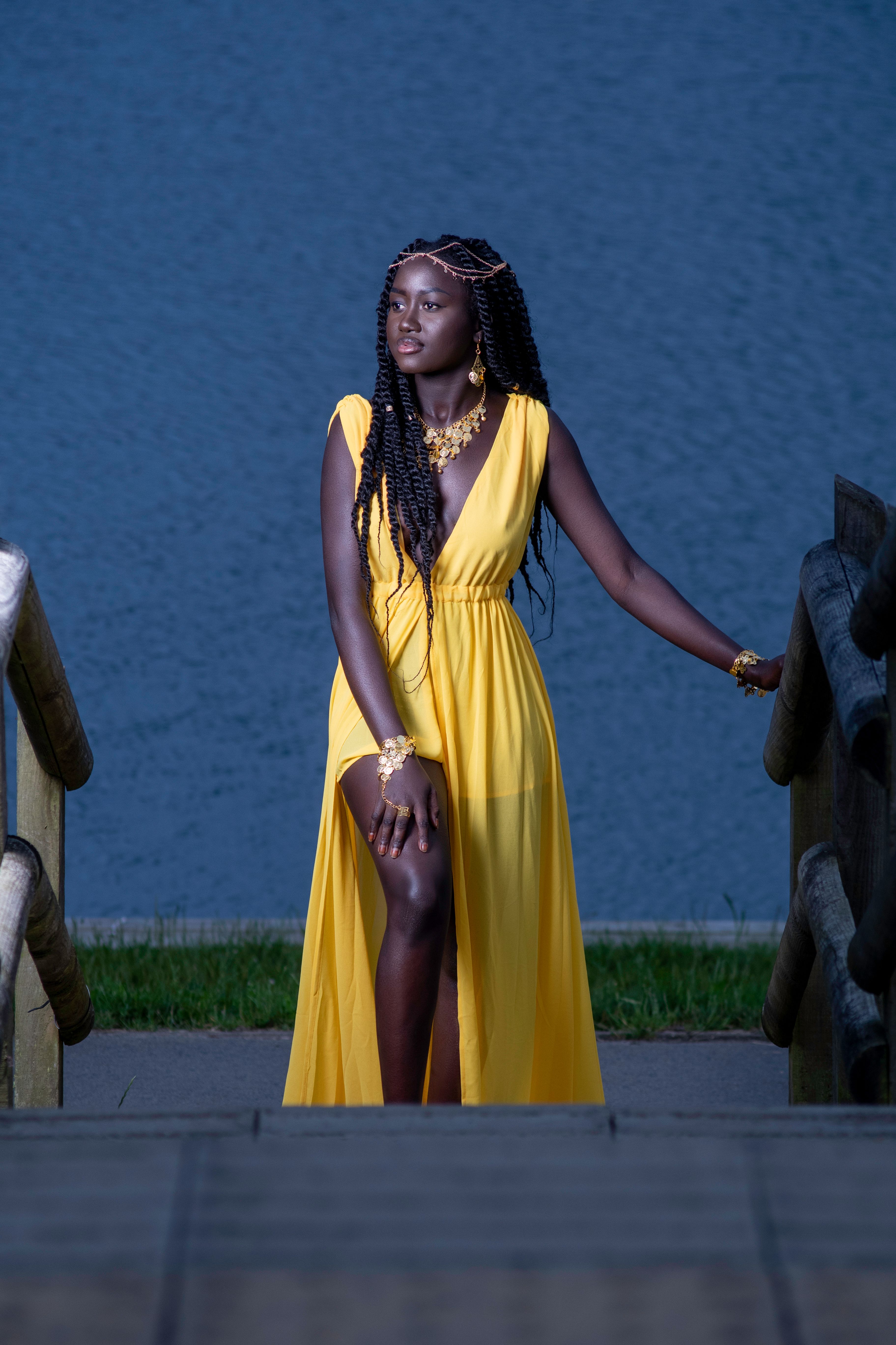 A Woman in Yellow Dress Standing · Free Stock Photo