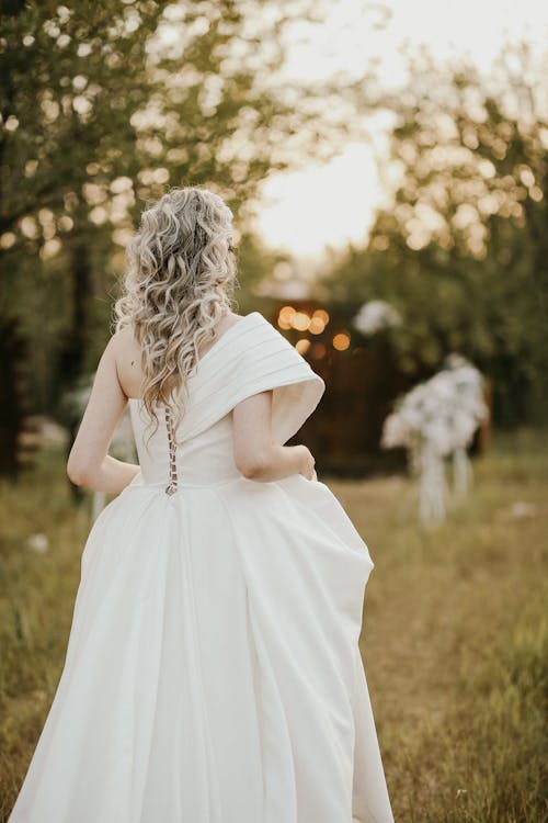 Selective Focus of a Woman Wearing White Gown