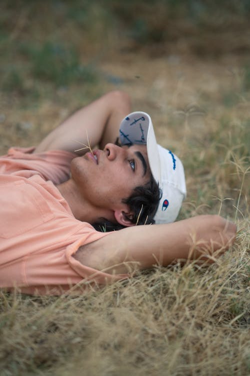 A Man Lying Down on Grass