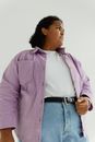 Woman in Pink Dress Shirt and Blue Denim Jeans