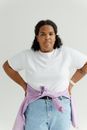 Woman in White Crew Neck T-shirt and Blue Denim Shorts