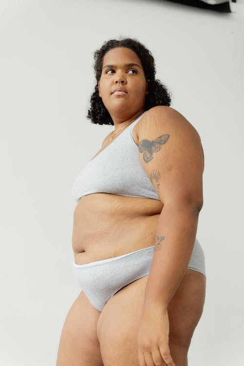 Woman in white underwear - Stock Photo - Masterfile - Premium