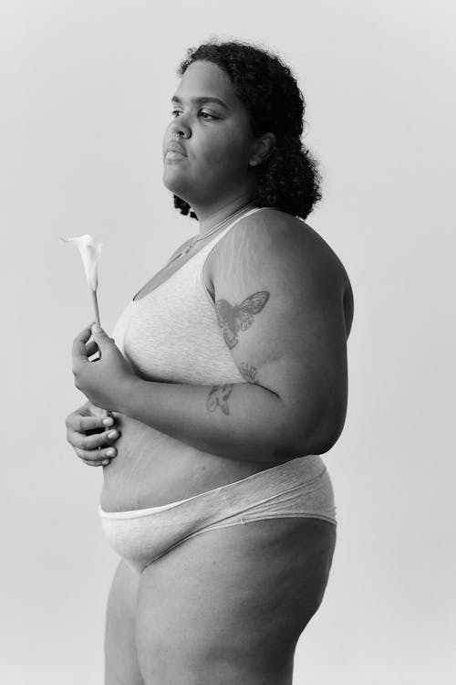 Plus Size Woman Posing in Underwear at a Photoshoot 